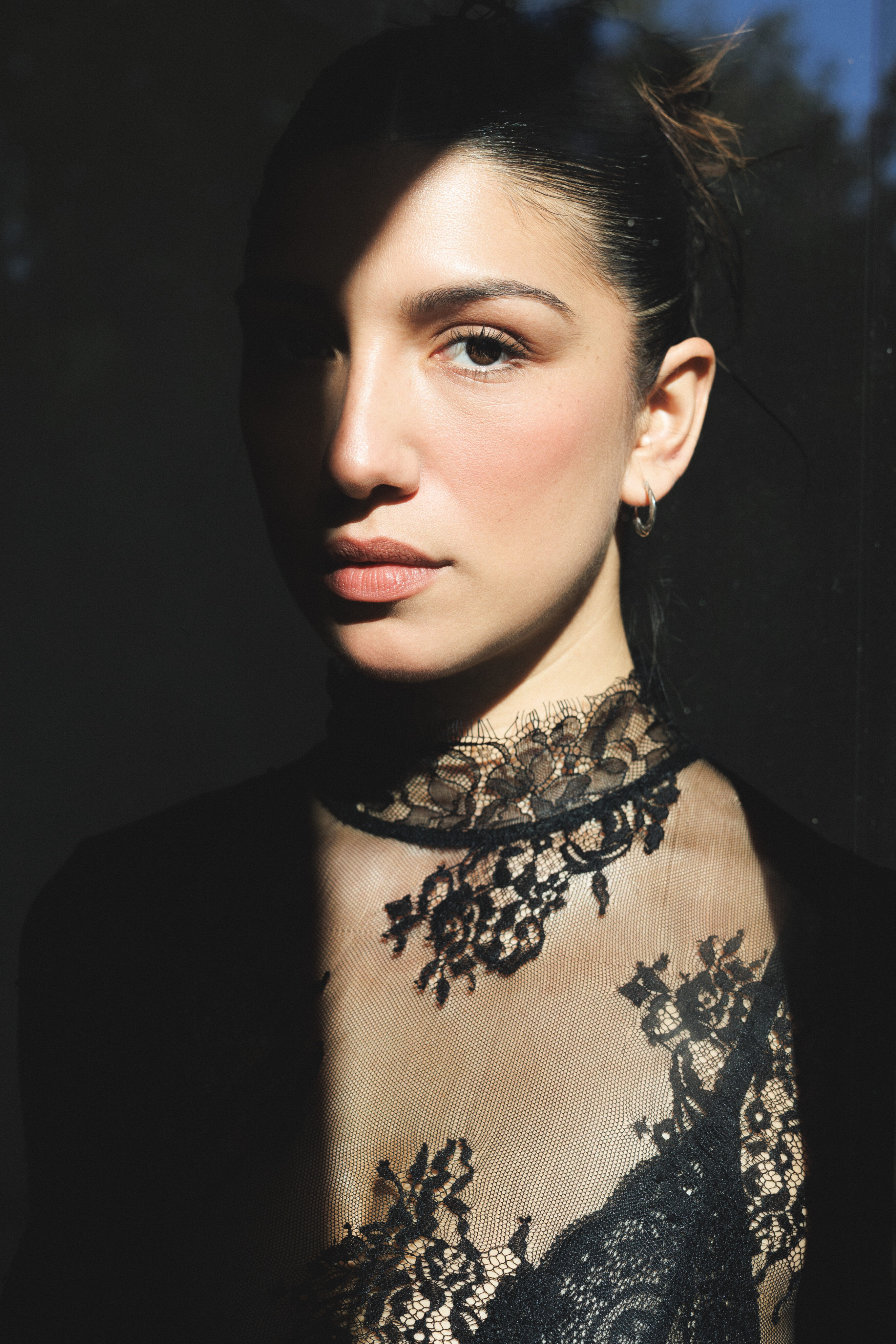 Shadow and Lace: A Chiaroscuro Portrait