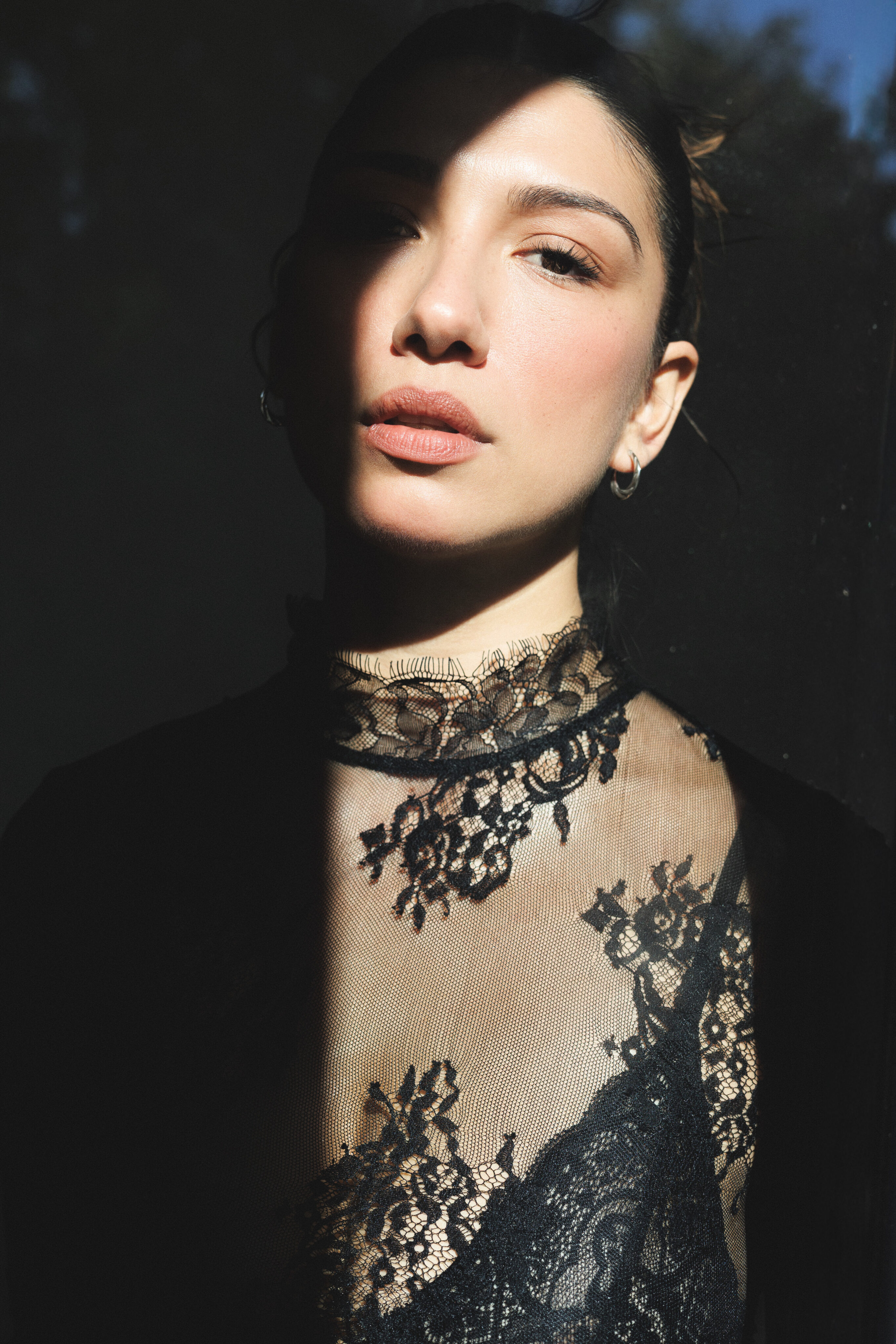 Shadow and Lace: A Chiaroscuro Portrait