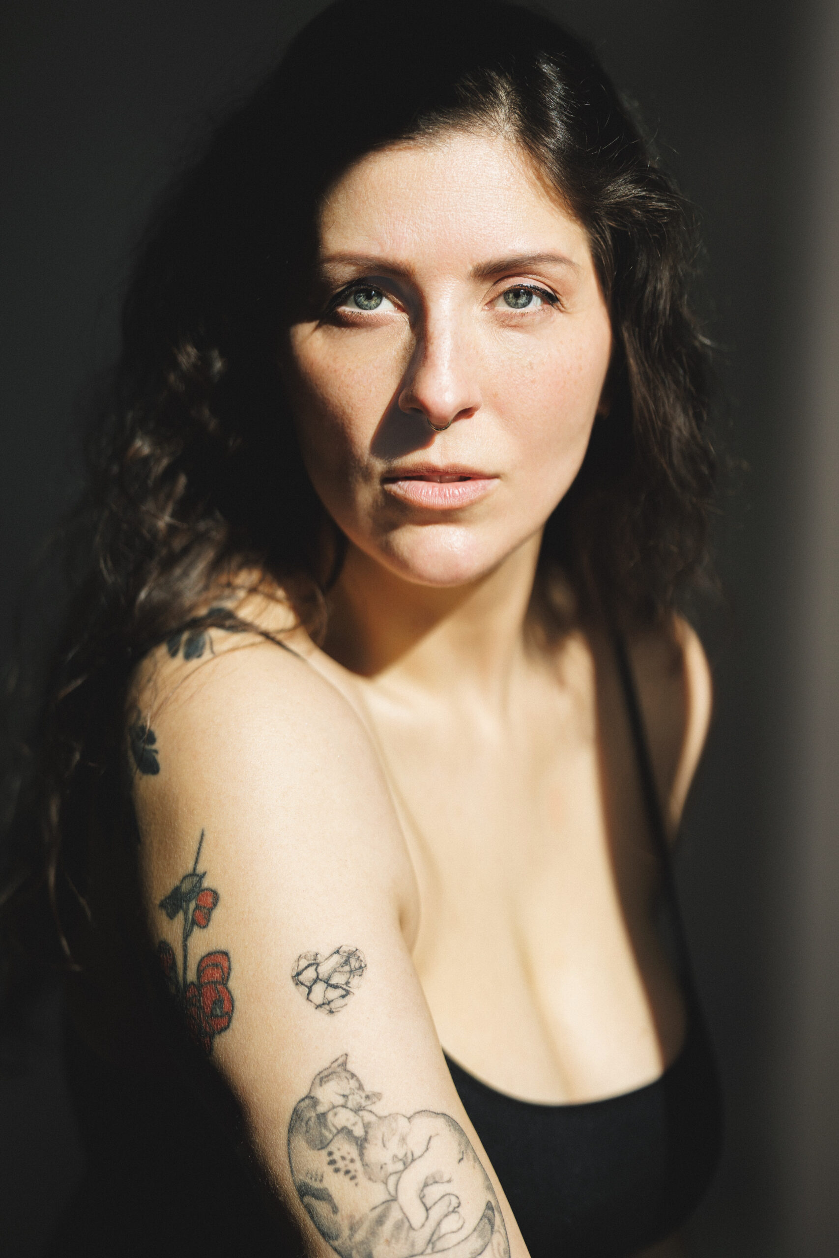 Moody Portrait of a Woman with Tattoos