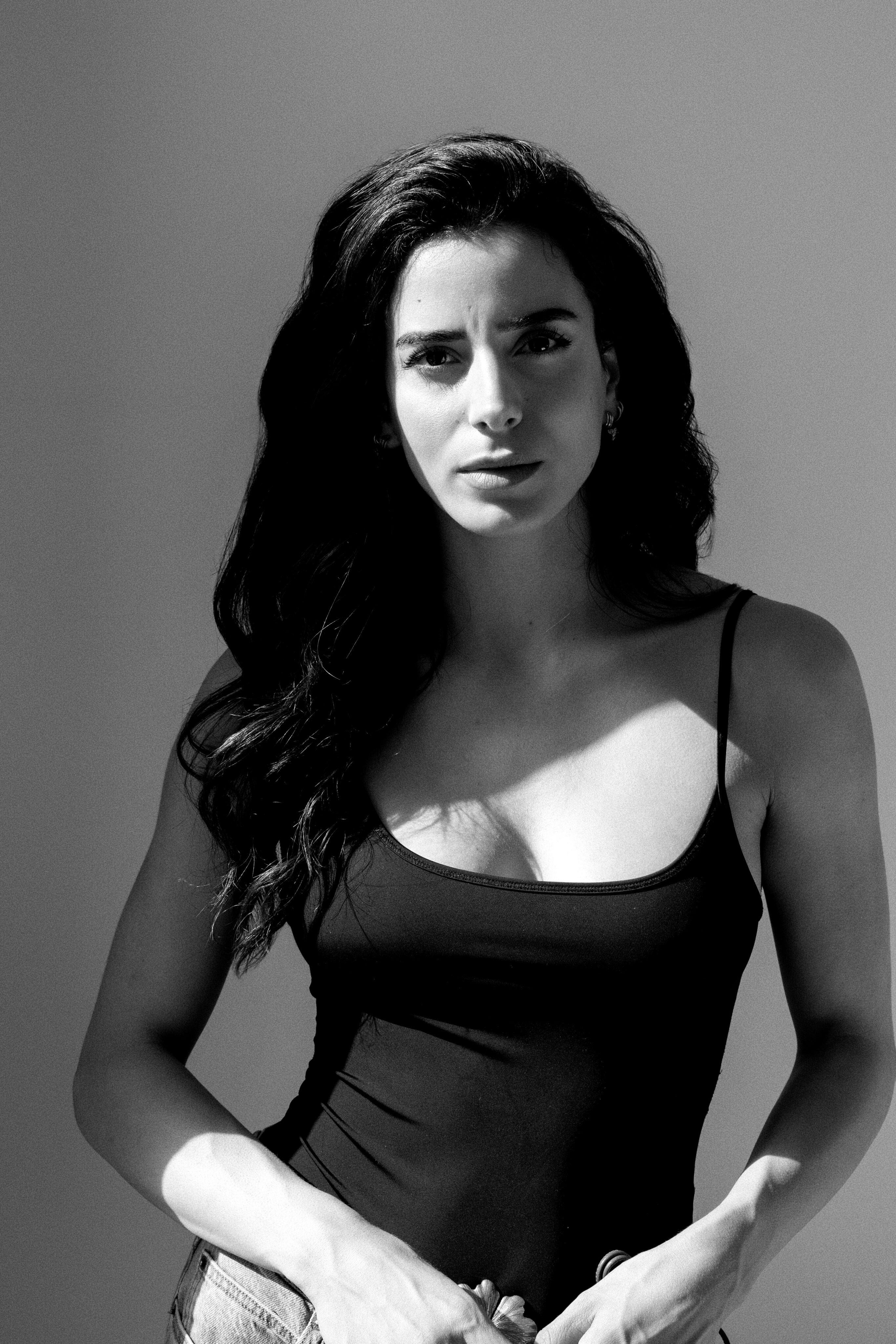 Pensive Portrait in Black Bodysuit